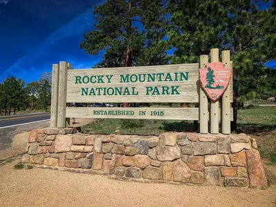 a sign for the rocky mountain national park at Relax in Luxury - Jacuzzi, Indoor/Outdoor Fireplace in Estes Park