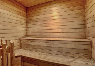 a wooden sauna with a wooden bench in it at 1168 Flying Dutchman condo in Keystone