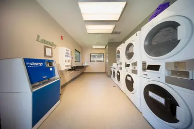 a laundry room with a washer and dryer at Hi Country Haus Unit 2115 by Stay WinterPark in Winter Park