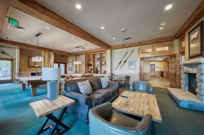 a living room with a couch and a table at Buffalo Lodge 2 Bed 2 Ba BLCD2 in Keystone