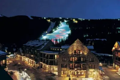 a town with a mountain in the background at night at Wild Irishman 1027 - Keystone in Keystone