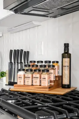 a shelf with a bottle of wine on a stove at Gallery Retreat - Skyline Views - Zuni Lofts in Denver