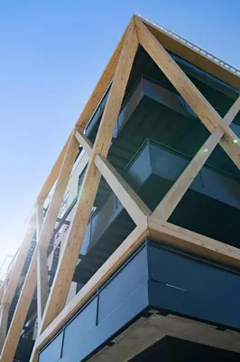 an angled view of a building with glass at A Luxe Point of View - Pet-Friendly - Zuni Lofts in Denver