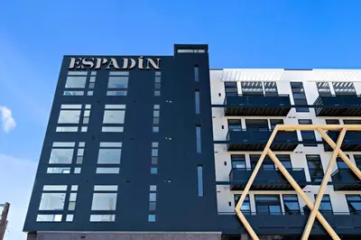 a tall building with the words reputation on it at Colorful Western Vibe - Pet-Friendly - Zuni Lofts in Denver