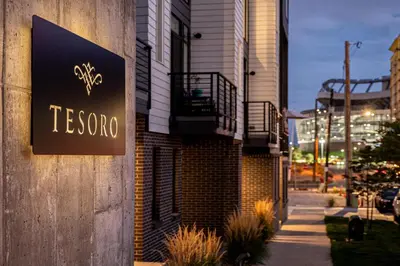 a sign on the side of a building at City Views! - Chic Jefferson Park Condo - Tesoro in Denver