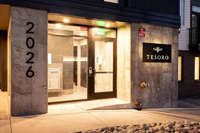 a store front with a sign on the door at Luxurious Escape - Walk to Empower Field - Tesoro in Denver