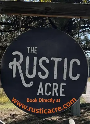 a sign for the rustic age book directory at theresartifacts at Twin Owls Lodge, Great for families Master bedroom, Loft, full kitchen, Dogs OK in Estes Park