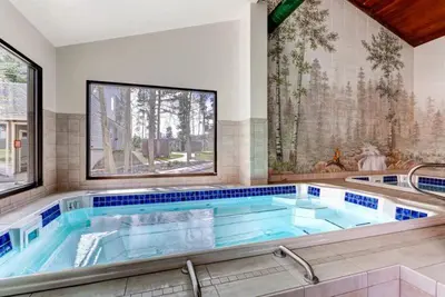 a large swimming pool in a house at 3 Bedroom Condo In West Keystone Near Lakeside Village in Keystone
