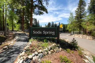 a sign for sooda spring on the side of a road at Soda Springs 1 Bedroom Townhome in Keystone