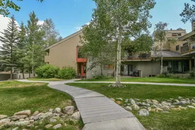 a walkway in front of a building at 2 Bedroom Condo In Keystone - West Keystone in Keystone