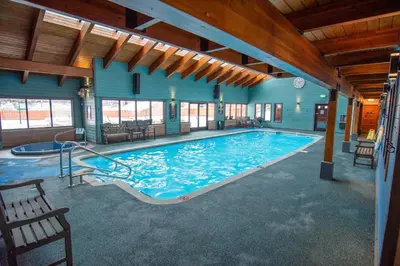 a large swimming pool in a building with a large pool at Mountainside Pineview Condo: Cozy Frisco Retreat in Frisco