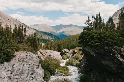 a view of a mountain valley with a river at Mountainside Pineview Condo: Cozy Frisco Retreat in Frisco