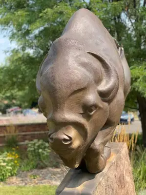 a bronze statue of a face on a rock at Spacious, Cal King Bed, Sleeps 6, Full Kitchen in Loveland