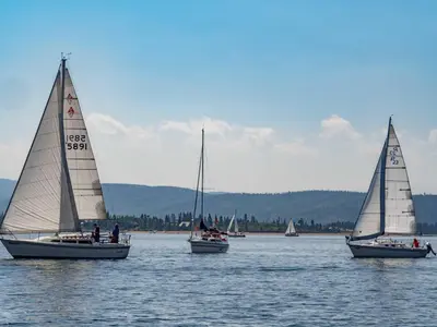 a group of sailboats in a large body of water at Overlook, 0015 in Granby