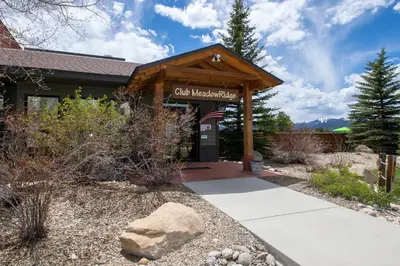 a building with a sign that reads city membership at Meadow Ridge Court 8 Unit 6 in Fraser