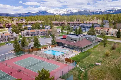 an aerial view of a tennis court and buildings at Meadow Ridge Court 28 Unit 6 in Fraser