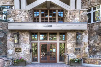 a stone building with a door with the number on it at Lone Eagle 3017 in Keystone